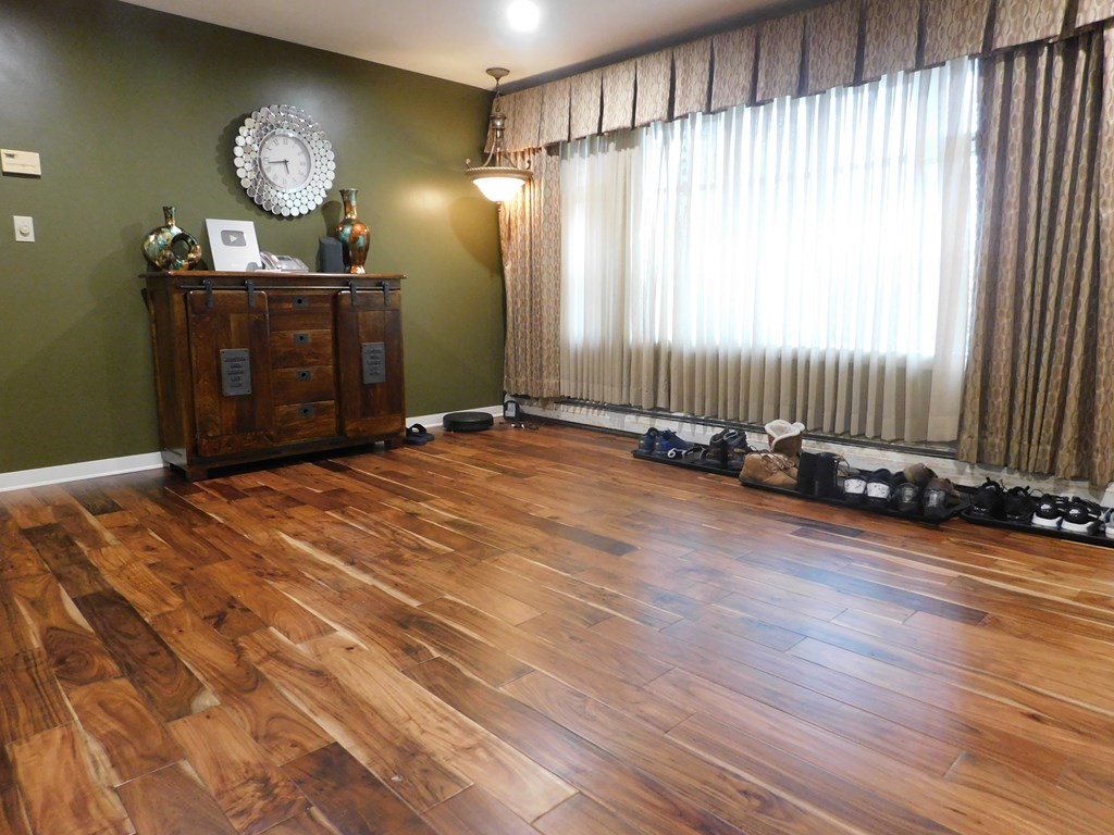 44 Delmar Road Brockton, MA 02302 - Photo 4 of 19 a view of a room with lots of wooden floor