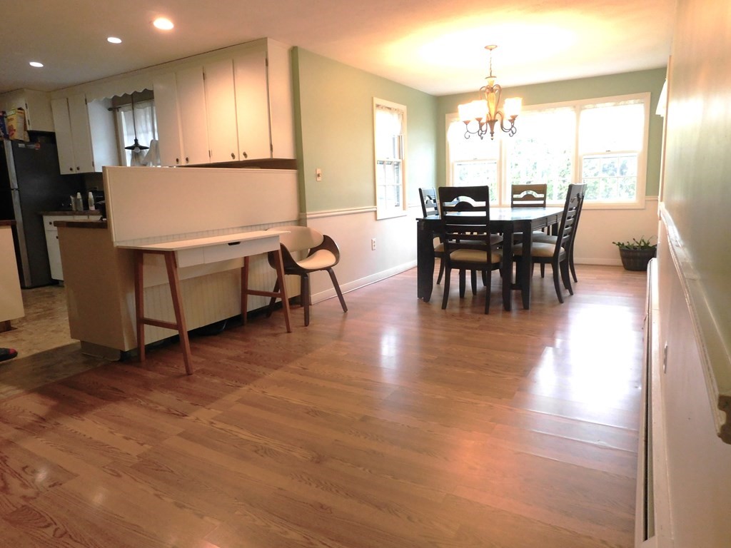 44 Delmar Road Brockton, MA 02302 - Photo 5 of 19 a view of a dining room with furniture window and outside view