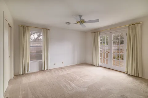 a bathroom with a sink toilet and mirror