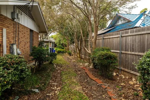 a backyard of a house with lots of green space
