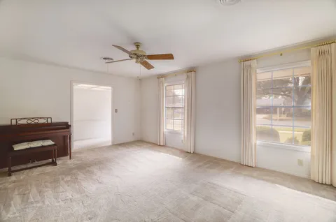 an empty room with windows