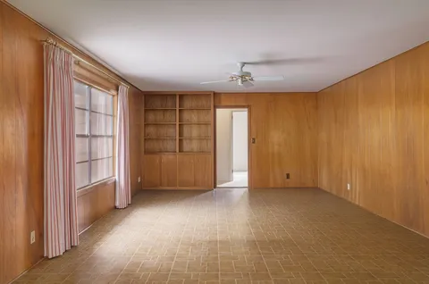 a view of a livingroom with a staircase