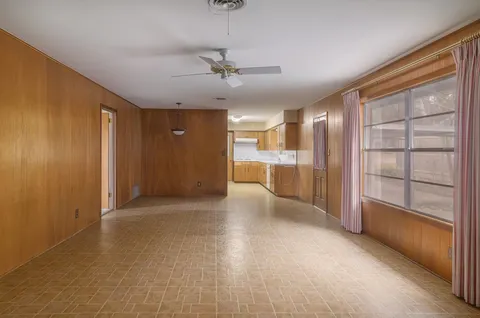 a kitchen with a sink stove and refrigerator