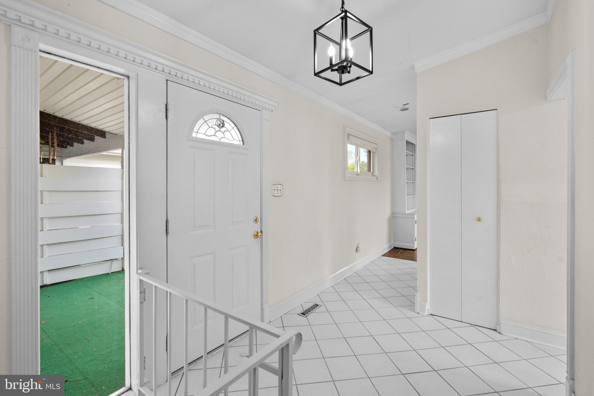 3919 Setonhurst Road Pikesville, MD 21208 - Photo 6 of 29 Hallway view of back door