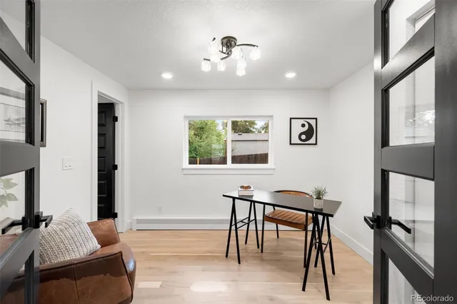 a workspace with furniture and window