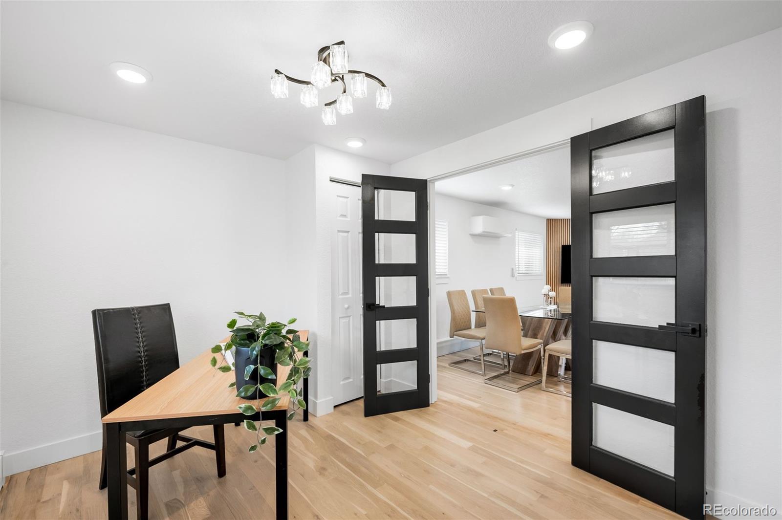 3860 Dudley Street Wheat Ridge, CO 80033 - Photo 26 of 35 a view of a livingroom with furniture and window