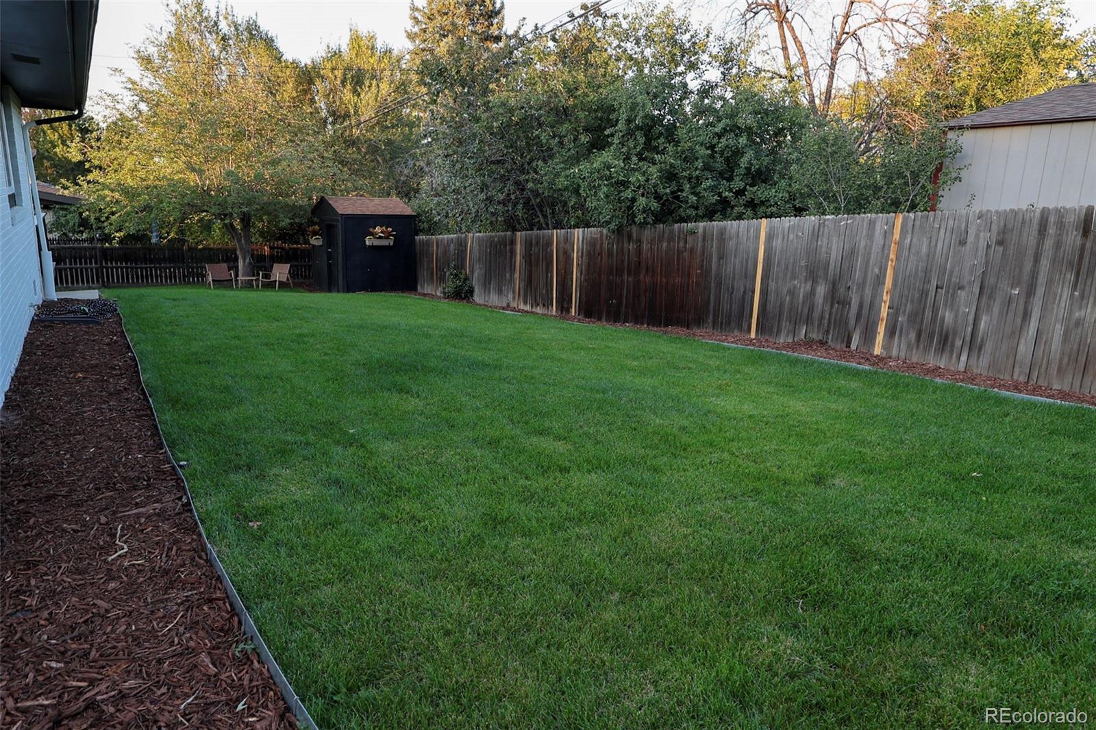 3860 Dudley Street Wheat Ridge, CO 80033 - Photo 32 of 35 a view of a back yard