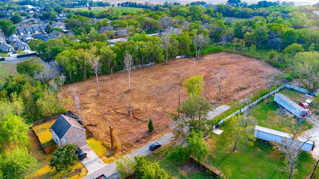 8888 Freeland Street Houston, TX 77075 - Photo 1 of 12 an aerial view of a house with a yard