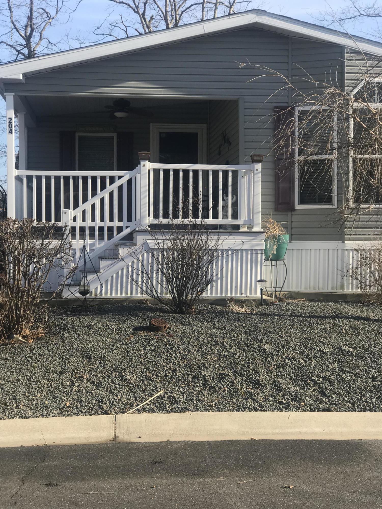 204 Roberts Road Toms River, NJ 08755 - Photo 1 of 19 a view of a house with a yard
