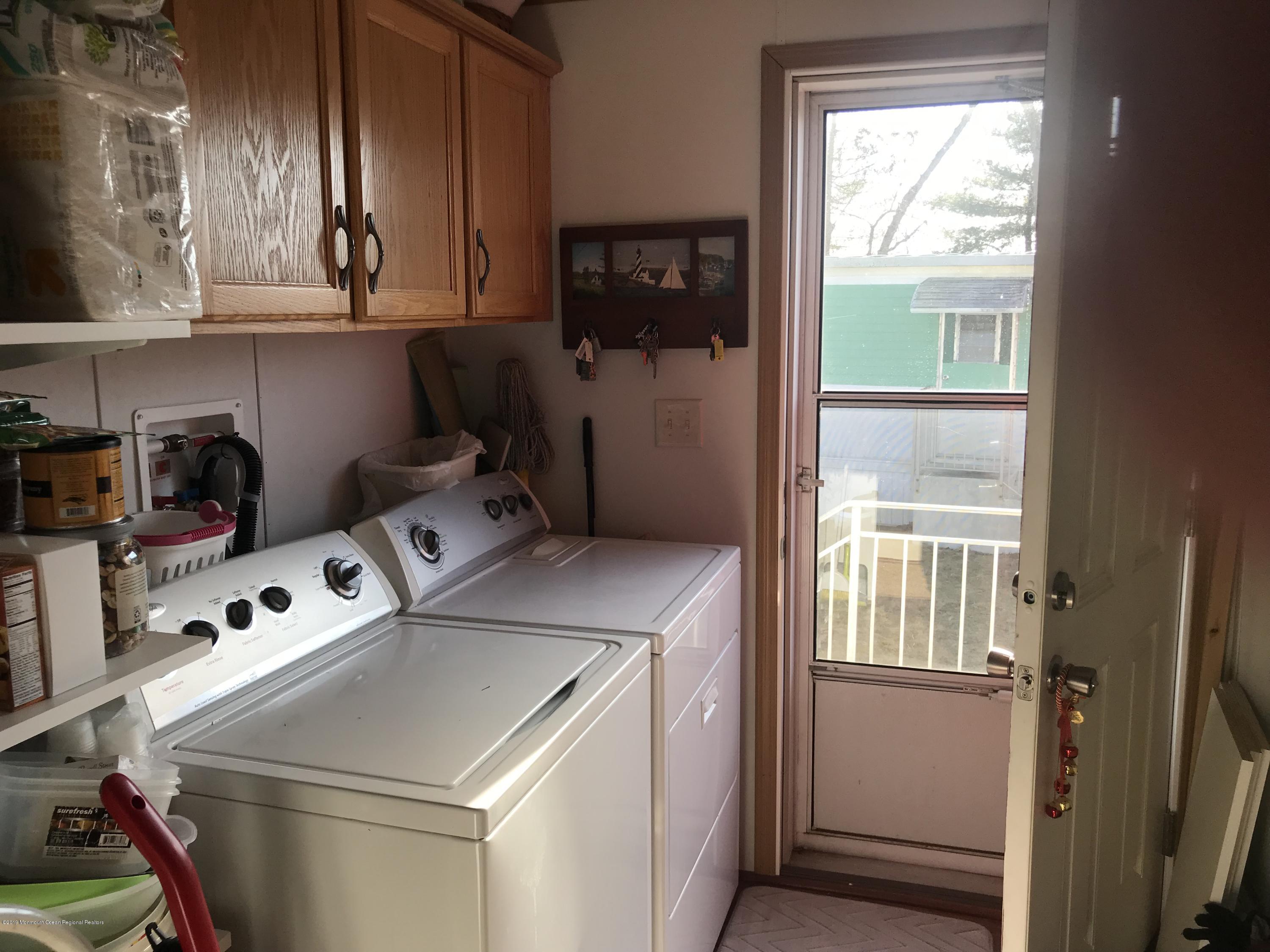 204 Roberts Road Toms River, NJ 08755 - Photo 18 of 19 a utility room with dryer and washer