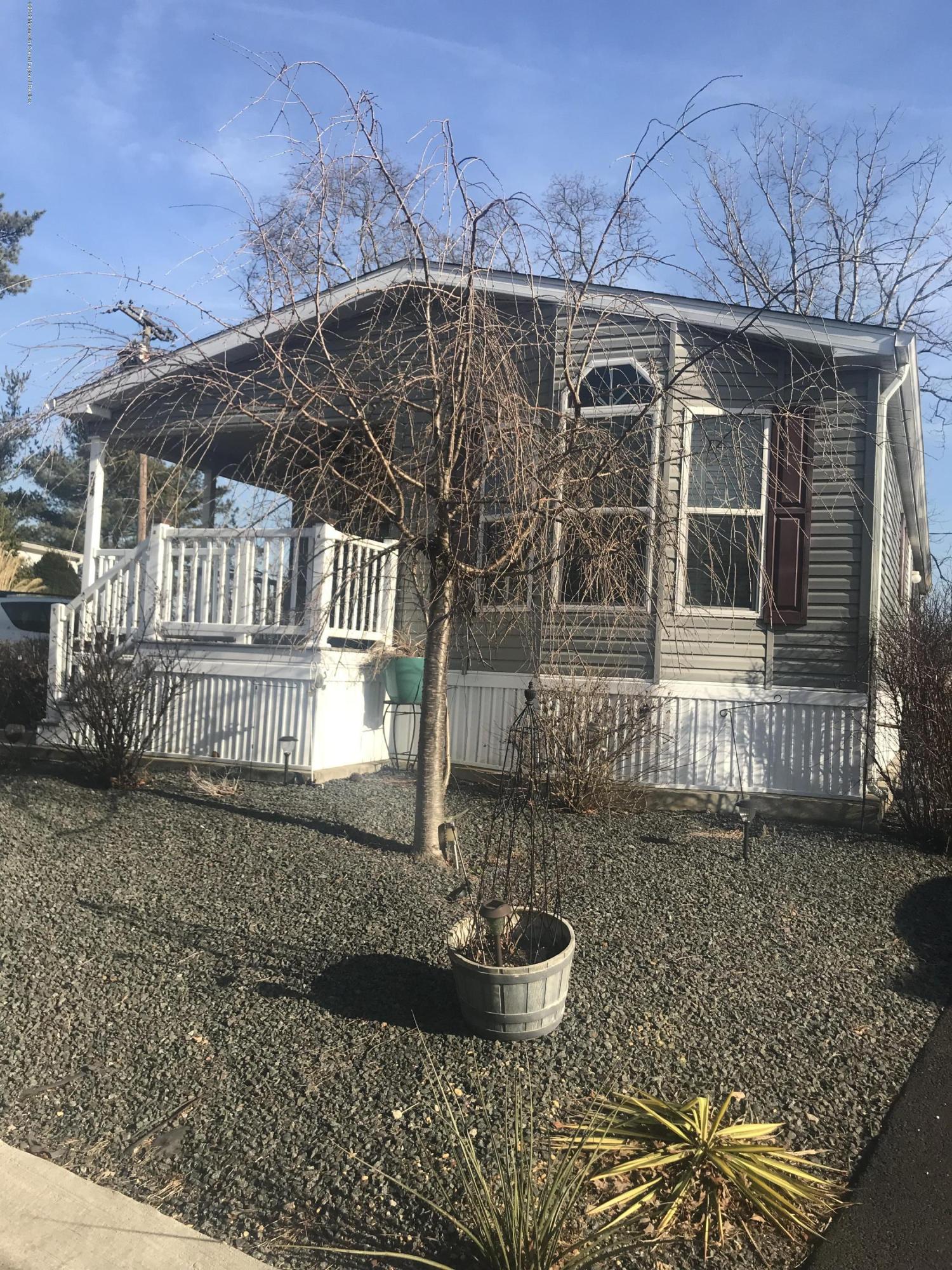 204 Roberts Road Toms River, NJ 08755 - Photo 4 of 19 a front view of a house with a yard
