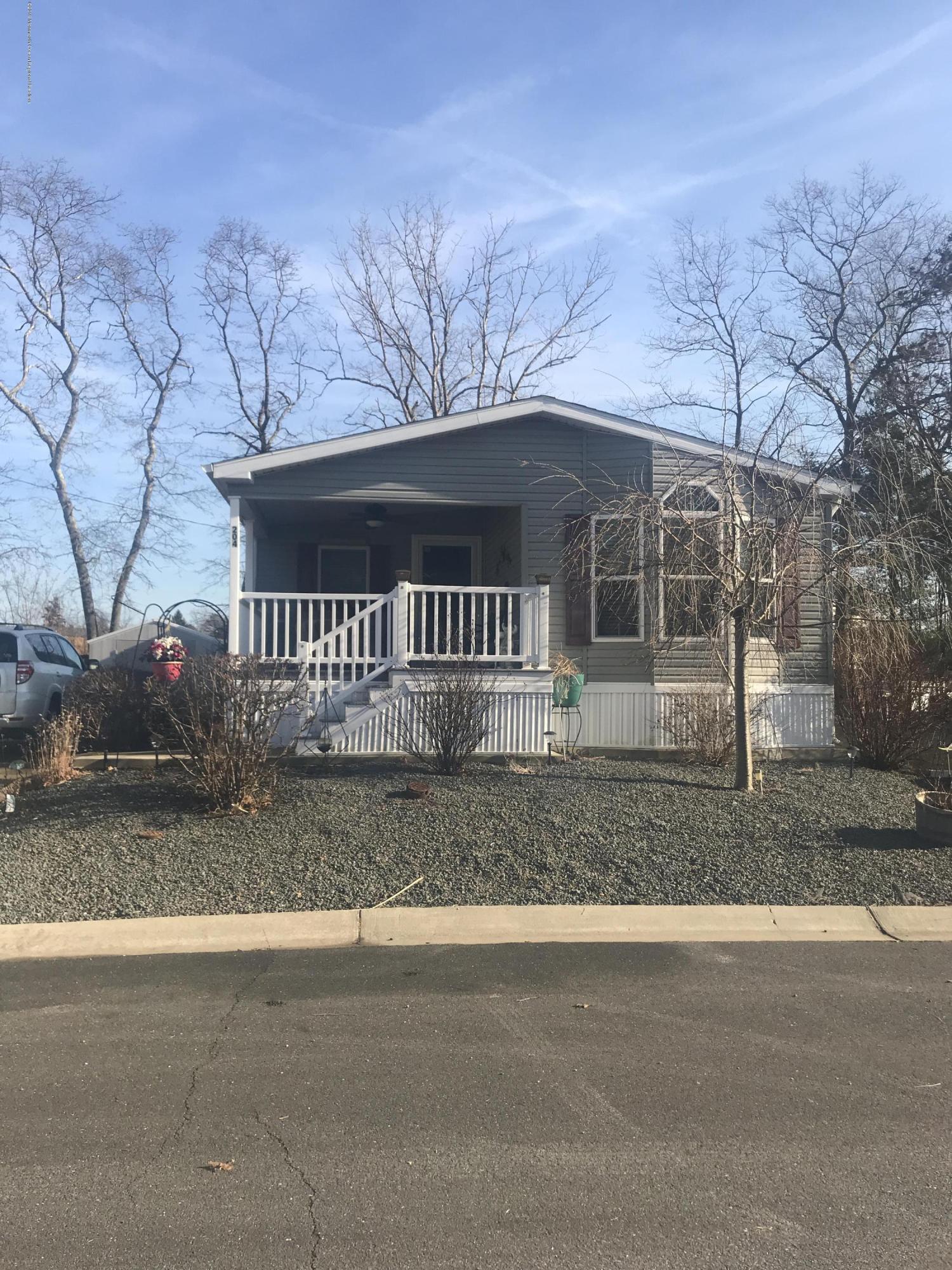 204 Roberts Road Toms River, NJ 08755 - Photo 5 of 19 a view of a house with a yard