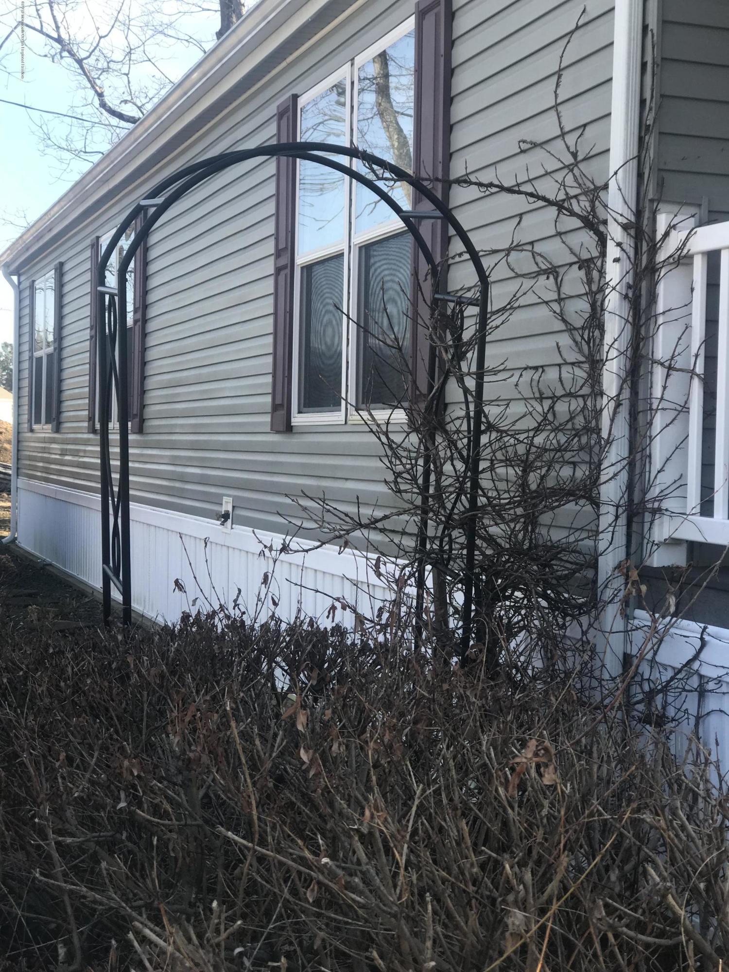 204 Roberts Road Toms River, NJ 08755 - Photo 7 of 19 a view of a house with a yard