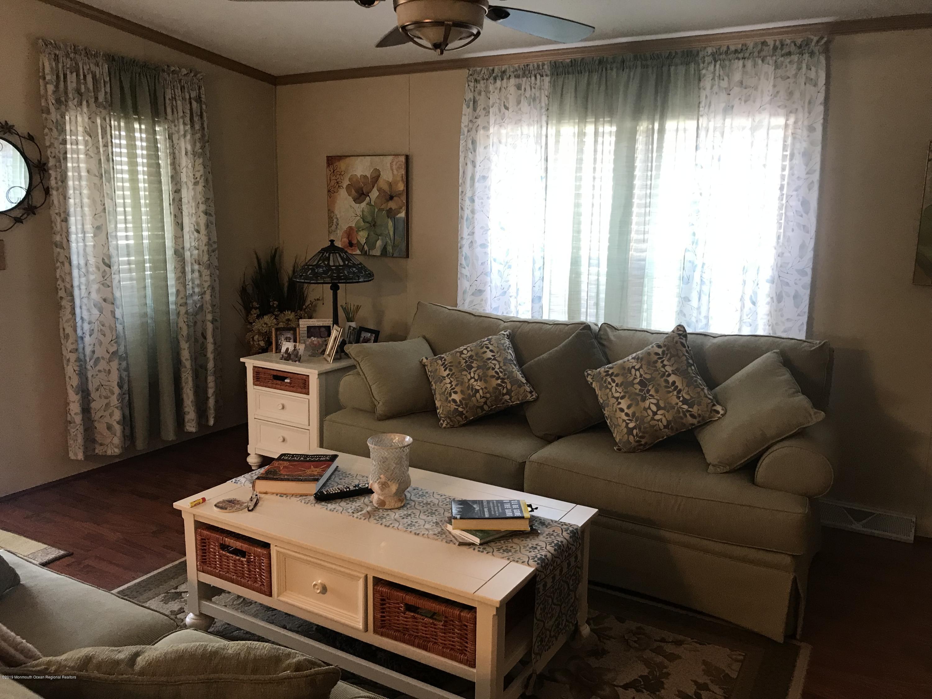204 Roberts Road Toms River, NJ 08755 - Photo 9 of 19 a living room with furniture and a window