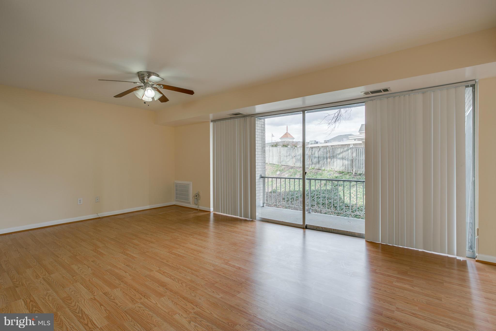 2519 Baltimore Road, Unit 3 Rockville, MD 20853 - Photo 7 of 22 Living Room w/Slider to Balcony