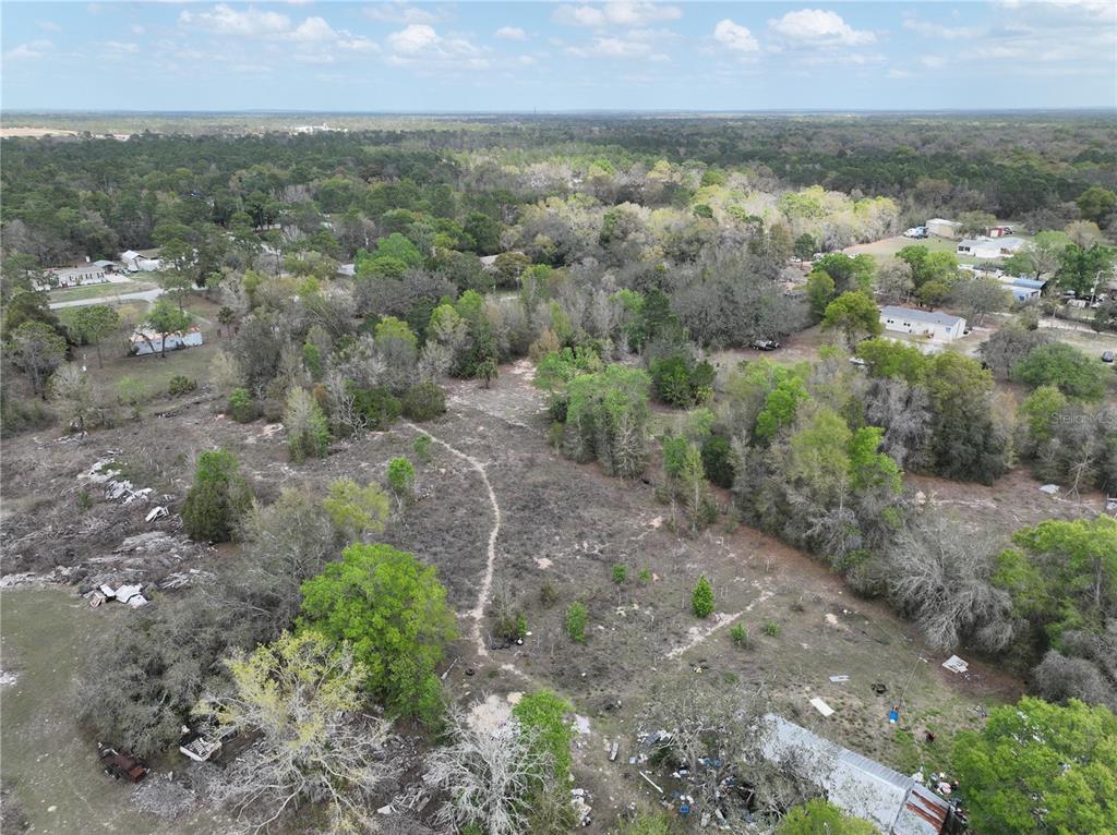 17783 Bonifay Lane Spring Hill, FL 34610 - Photo 3 of 9 a view of a yard with an outdoor space