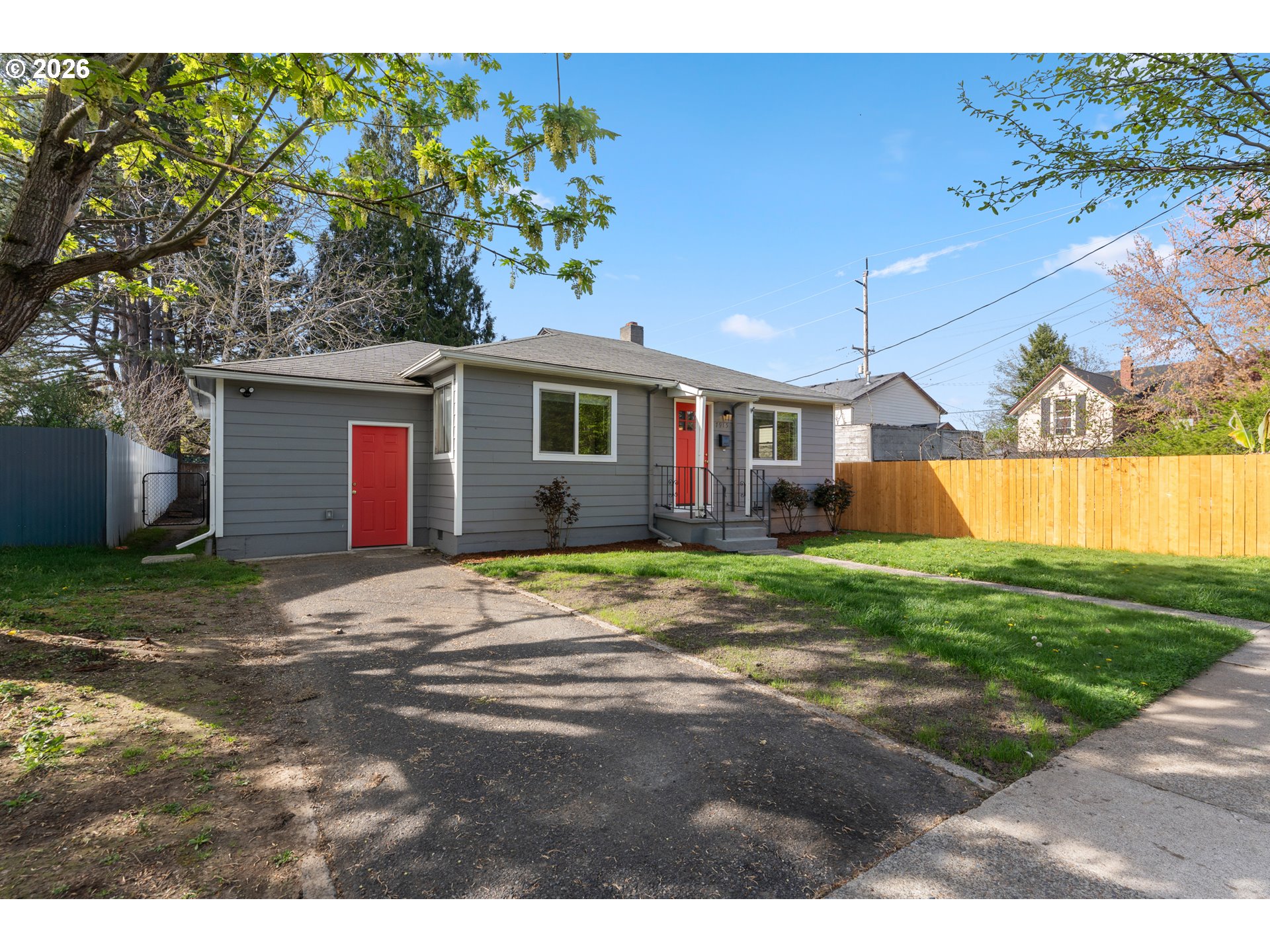 7915 North Exeter Avenue Portland, OR 97203 - Photo 2 of 34 a view of a house with a yard
