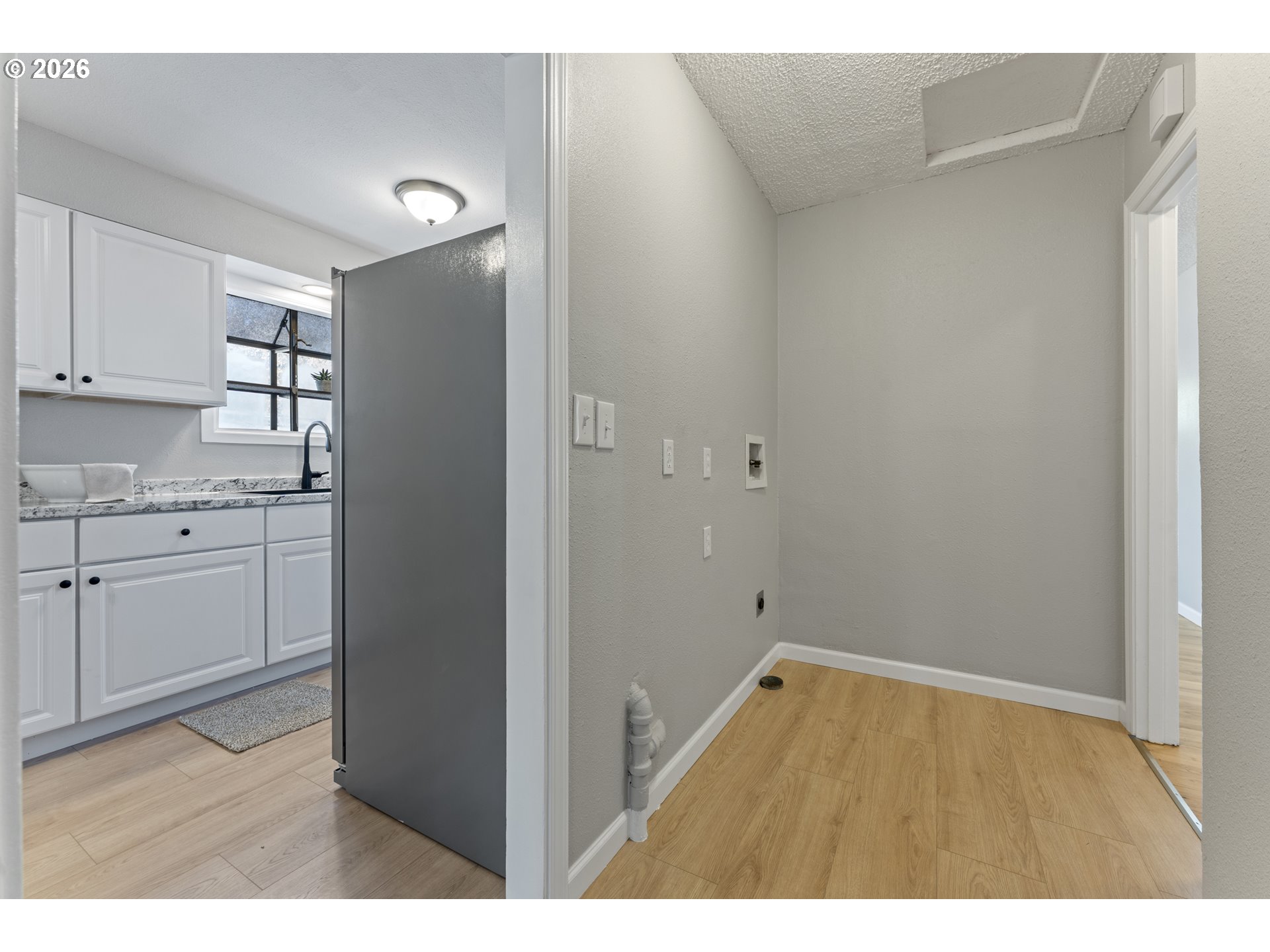7915 North Exeter Avenue Portland, OR 97203 - Photo 21 of 34 a kitchen with a sink and cabinets