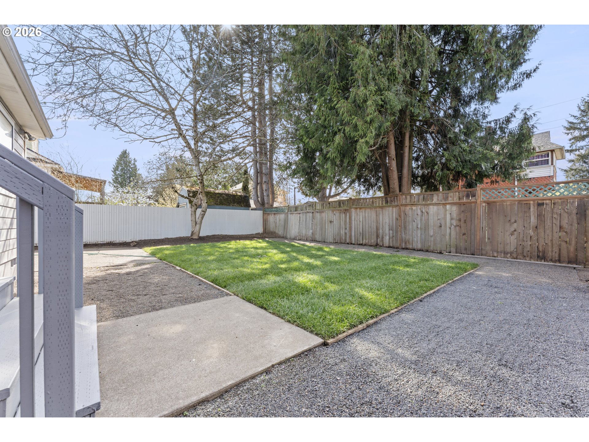 7915 North Exeter Avenue Portland, OR 97203 - Photo 29 of 34 a view of a back yard with green space