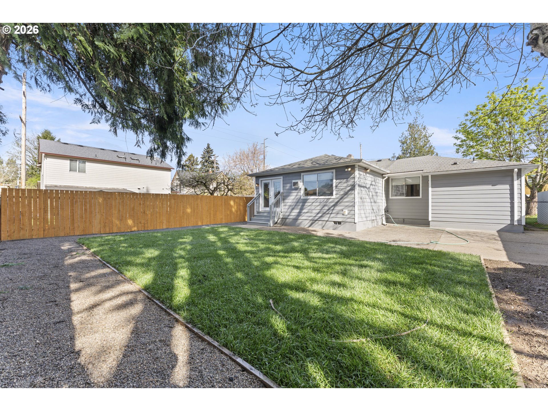 7915 North Exeter Avenue Portland, OR 97203 - Photo 30 of 34 a front view of a house with garden