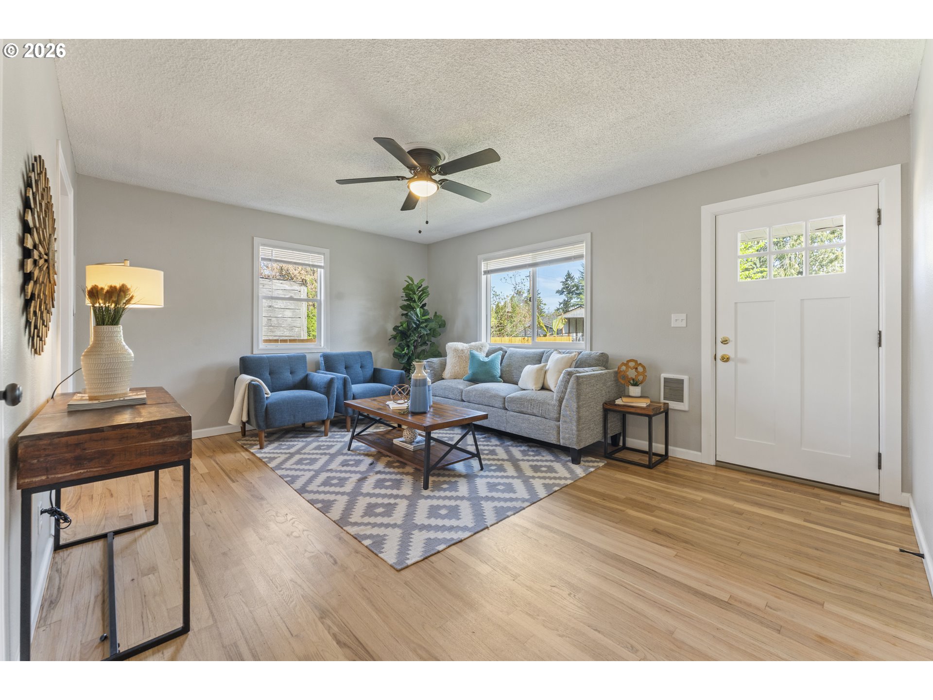 7915 North Exeter Avenue Portland, OR 97203 - Photo 4 of 34 a living room with furniture and a wooden floor