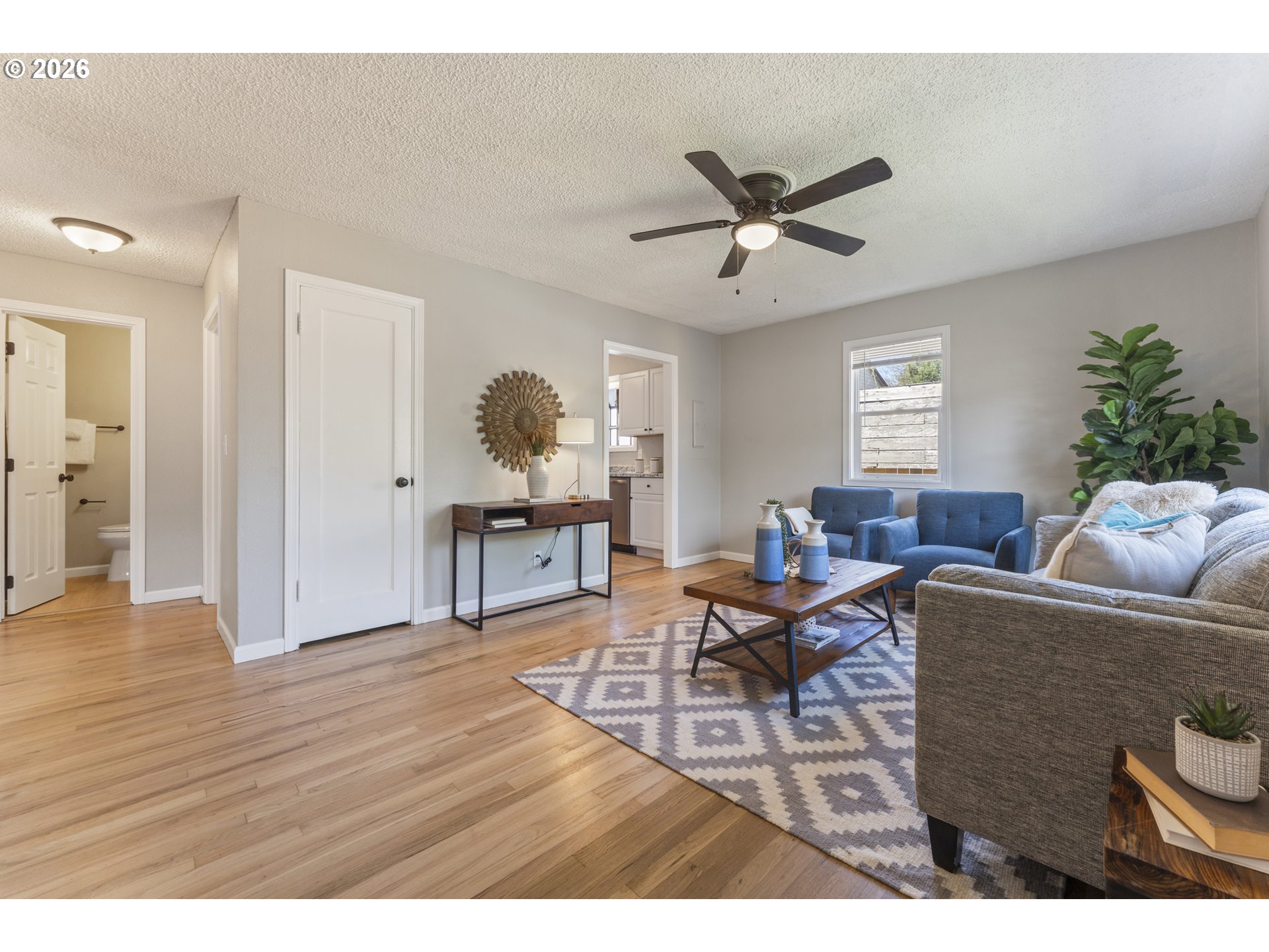 7915 North Exeter Avenue Portland, OR 97203 - Photo 6 of 34 a living room with furniture and a wooden floor