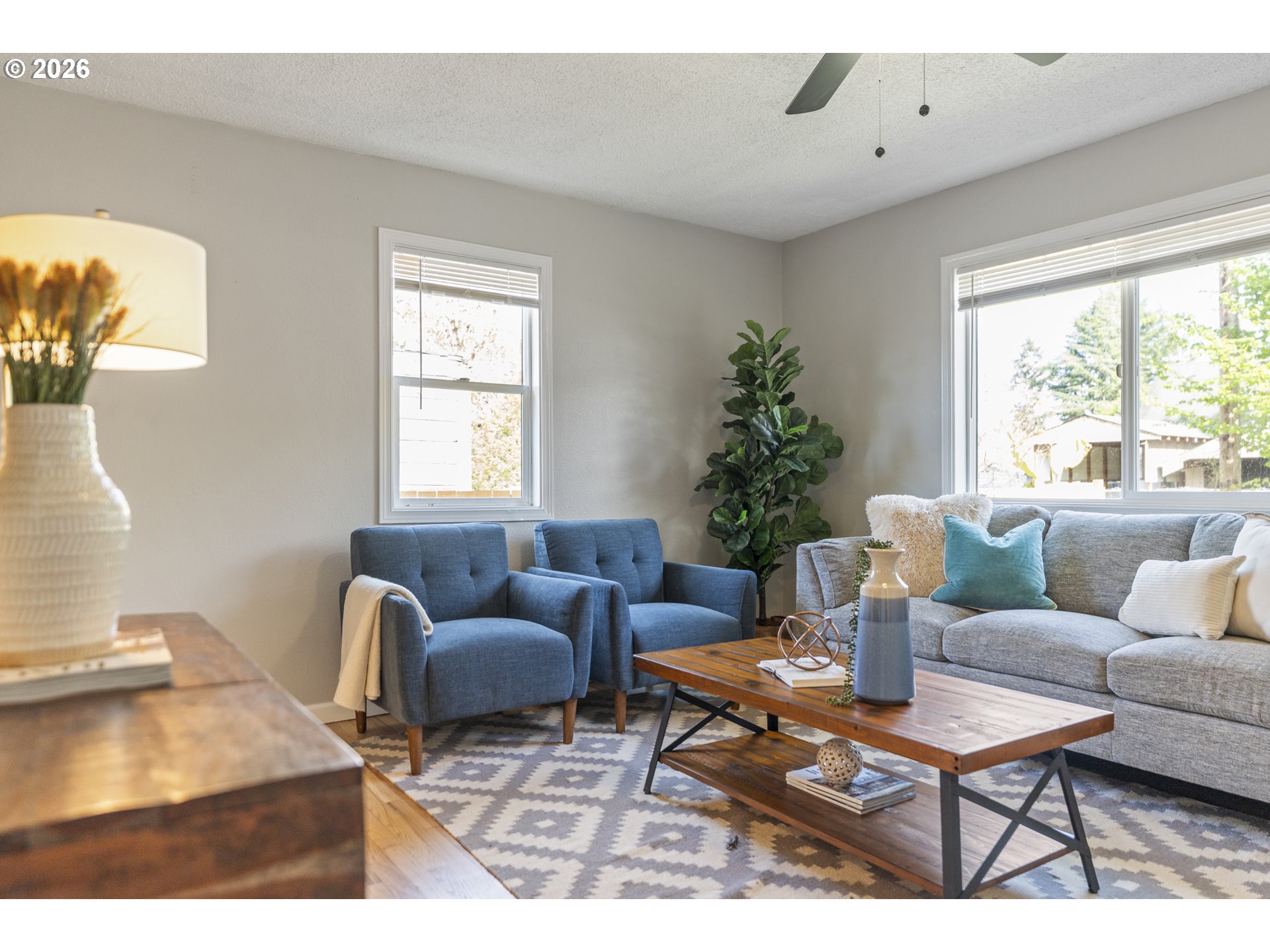 7915 North Exeter Avenue Portland, OR 97203 - Photo 7 of 34 a living room with furniture and a potted plant