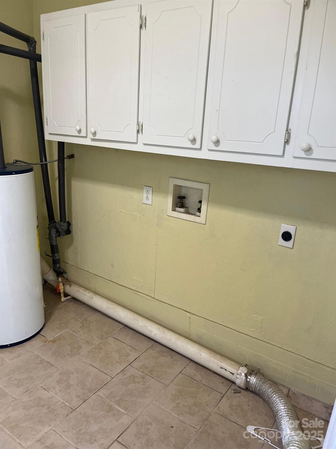104 Edison Street Kings Mountain, NC 28086 - Photo 25 of 28 a view of a utility room with granite countertop cabinets