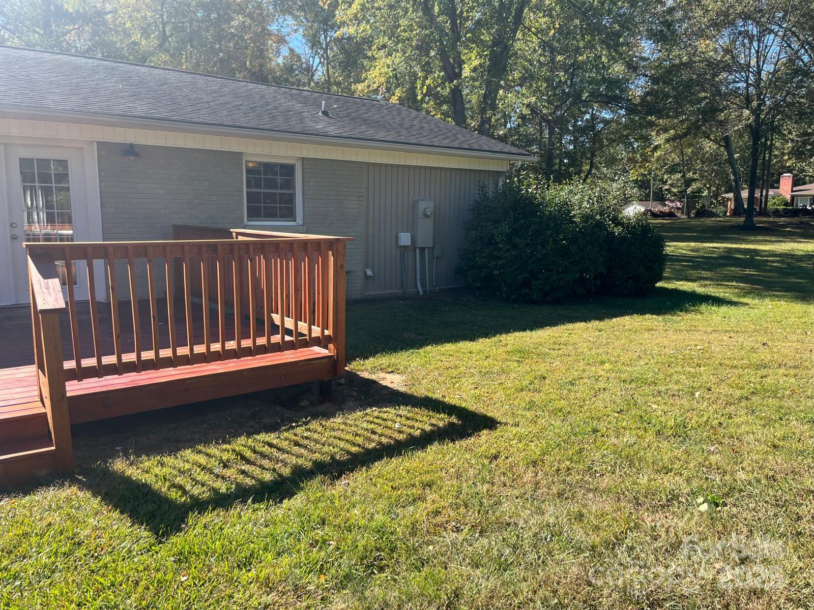104 Edison Street Kings Mountain, NC 28086 - Photo 6 of 28 a view of a backyard with a garden