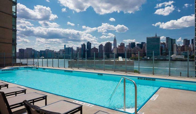 4-75 48th Avenue, Unit 1502 Queens, NY 11109 - Photo 10 of 12 a view of a lake