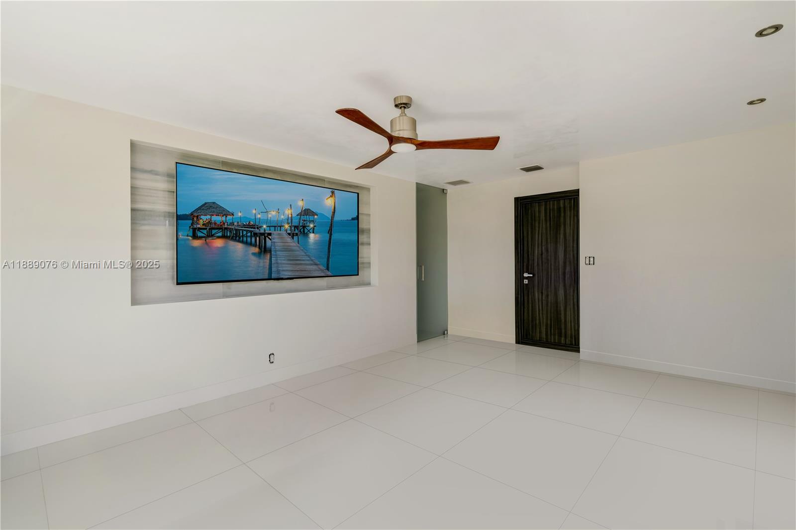 6763 Southwest 106th Place Miami, FL 33173 - Photo 17 of 38 a view of an empty room