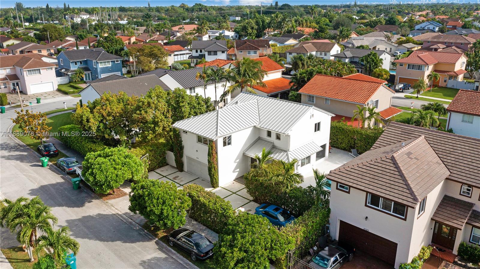 6763 Southwest 106th Place Miami, FL 33173 - Photo 30 of 38 an aerial view of residential houses with outdoor space