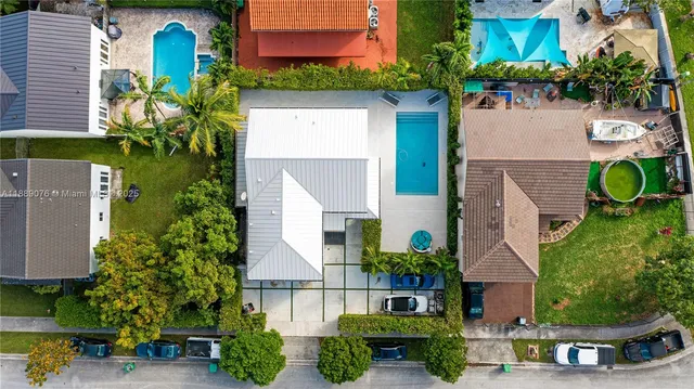 an aerial view of a house having yard