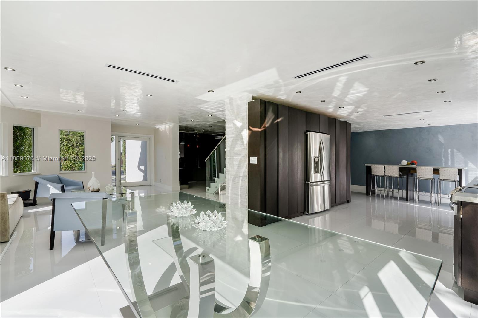 6763 Southwest 106th Place Miami, FL 33173 - Photo 5 of 38 a view of a dining room with furniture