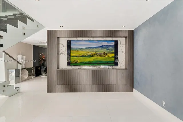 a dining hall with stainless steel appliances a table and chairs