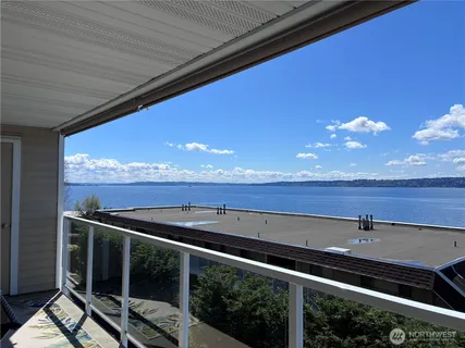 a view of balcony with furniture