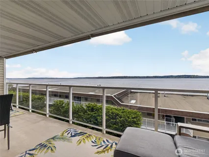 a balcony with furniture and outdoor space