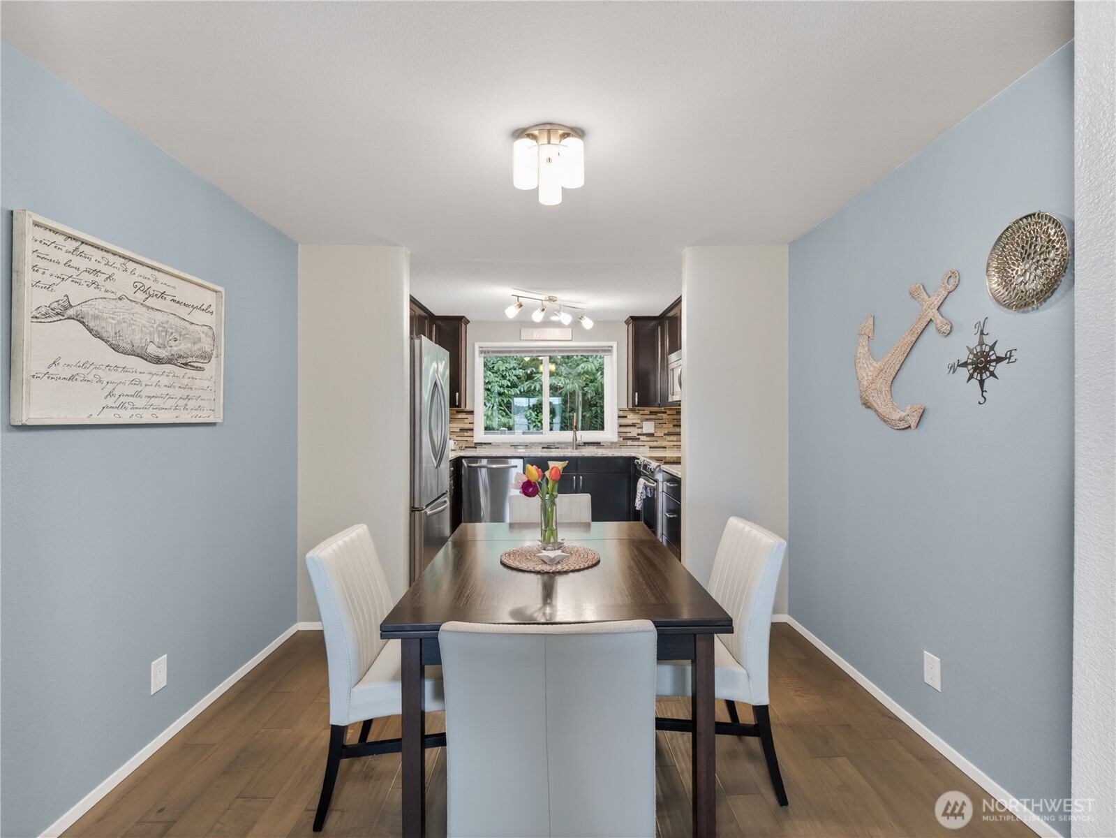 10203 47th Avenue Southwest, Unit C8 Seattle, WA 98146 - Photo 6 of 39 a dining room with furniture and window