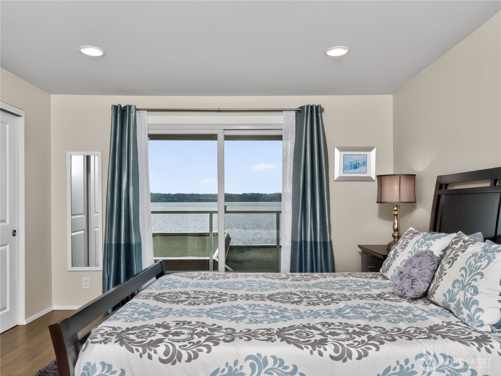 10203 47th Avenue Southwest, Unit C8 Seattle, WA 98146 - Photo 10 of 39 a bedroom with a bed and a large window