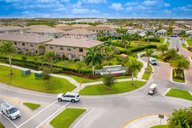 an aerial view of a pool yard and mountain view