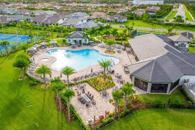 a kitchen with a sink and stainless steel appliances