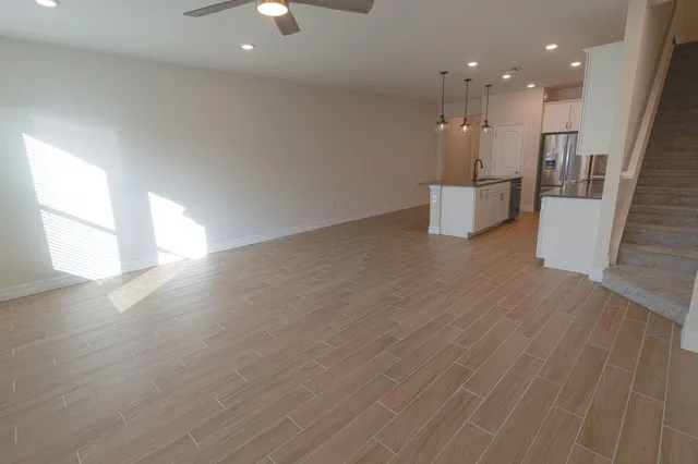 a bathroom with a sink a mirror and toilet