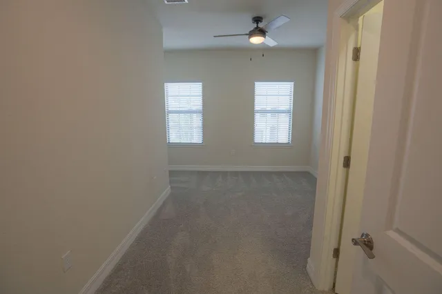 a view of a storage & utility room with a sink