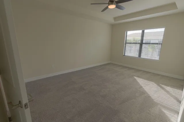 a view of outdoor space with swimming pool and seating