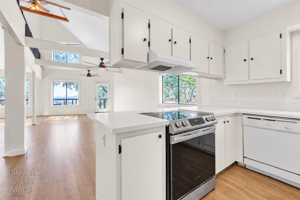 6880 Kahala Road Garden Valley, CA 95633 - Photo 5 of 31 Plenty of natural light. Vaulted ceilings and bright interior. Furnishings removed virtually.