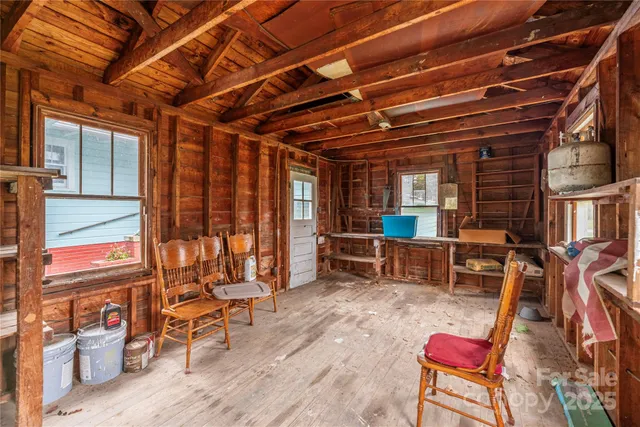 a view of a chairs in patio of the house