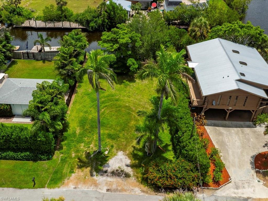 2977 Poplar Street Naples, FL 34112 - Photo 4 of 10 an aerial view of a house with a yard