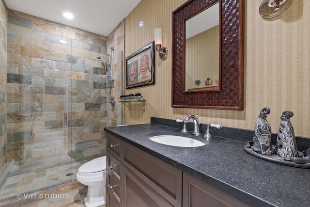 a view of a house with potted plants