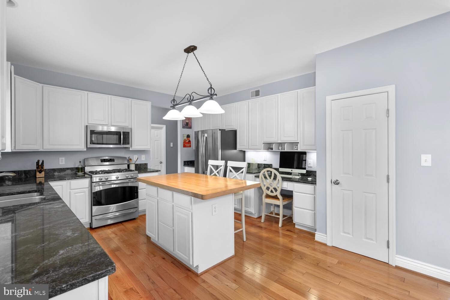 18107 Old Baltimore Road Olney, MD 20832 - Photo 17 of 50 Kitchen with Gorgeous Granite Counters