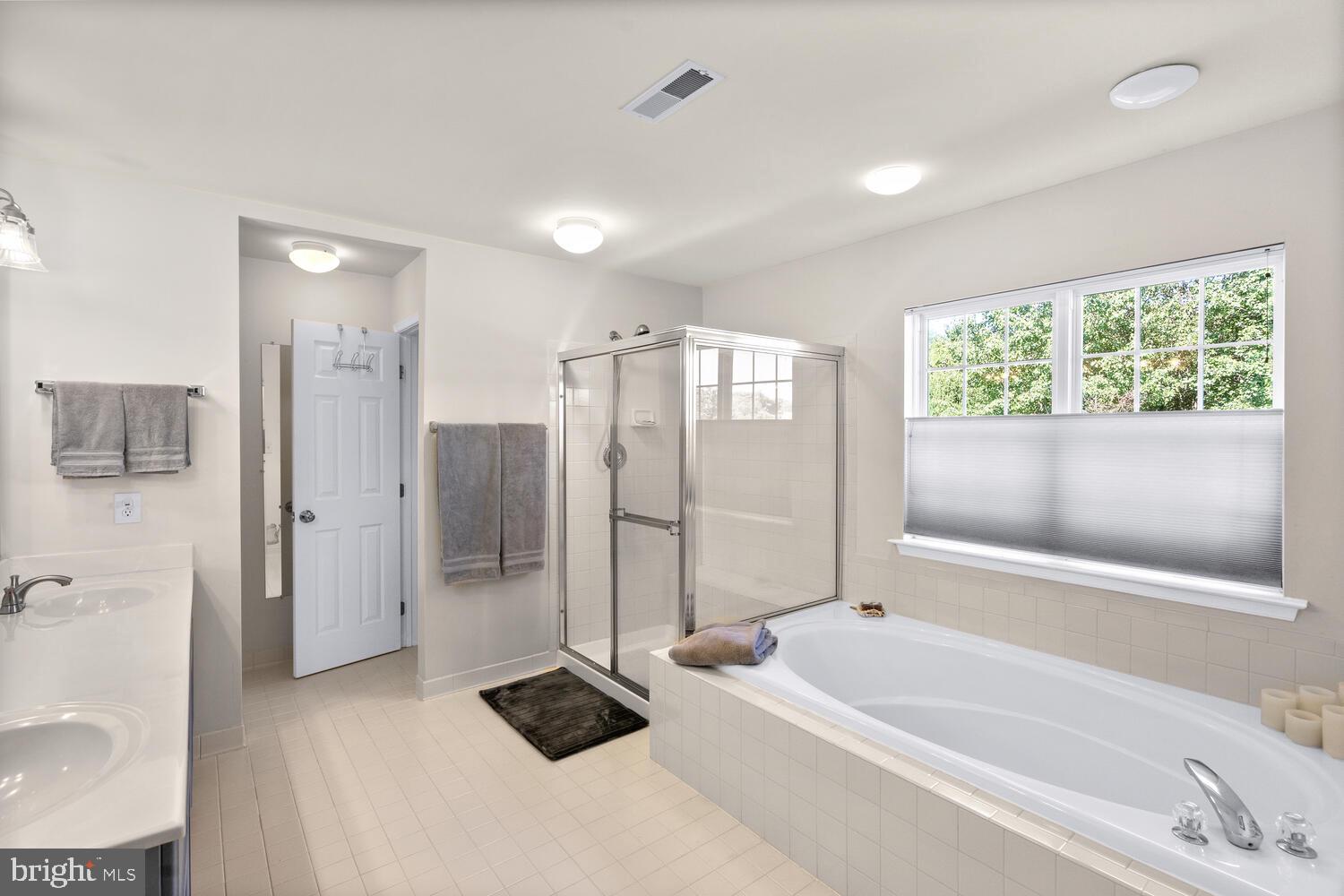 18107 Old Baltimore Road Olney, MD 20832 - Photo 26 of 50 Owner's Bath with Soaking Tub & Separate Shower